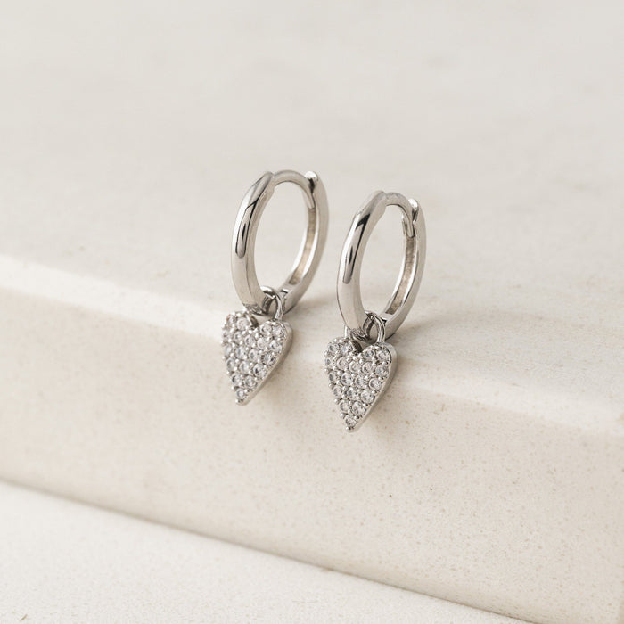 The Flutter Heart Huggie Drop Hoop Earrings